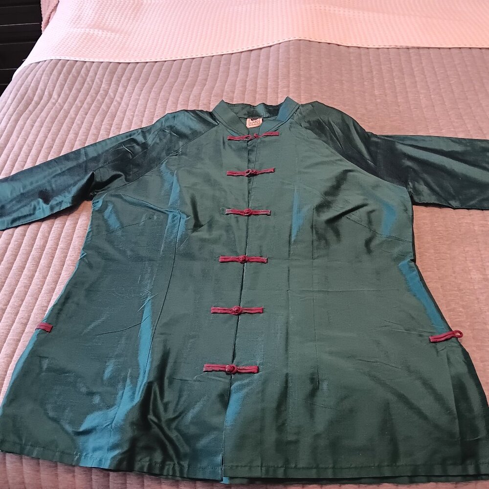 Generous fit chinoiserie style jacket/top in a rich dark green shade.